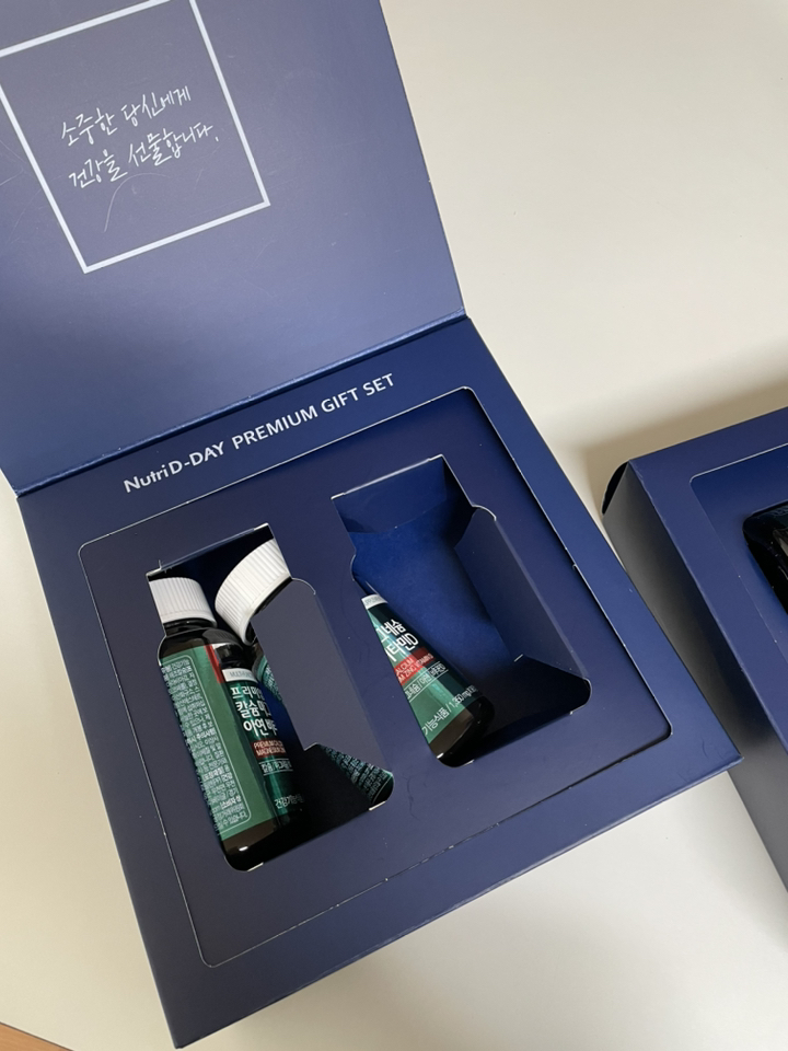 뉴트리디데이 칼슘 마그네슘 아연 비타민D 골드 쇼핑백