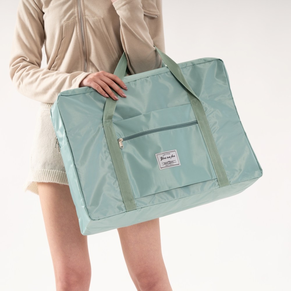 핑크빛 설렘을 담아 떠나는 몽땅겟 접이식 여행용 보스턴백