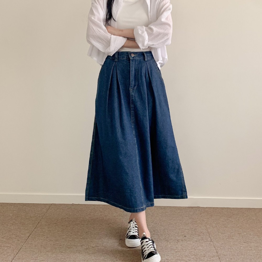세련된 실루엣과 편안함을 모두 갖춘 양놀 데님 롱 스커트