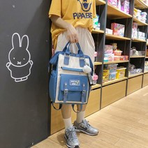 F 학교 가방 여성 어 버전 고등학교 중학생 중학생 2023 새로운 일본 대학 스타일 배낭 대학생 배낭, 블루 1076 위드 퍼 볼 펜던트