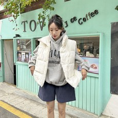 토마토팩토리 여성용 더즈 사선 하이넥 웰론 패딩조끼