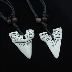 이빨통목걸이