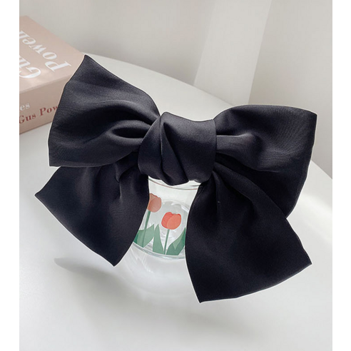 수스다 왕리본 머리핀으로 당신의 스타일을 완성하세요.