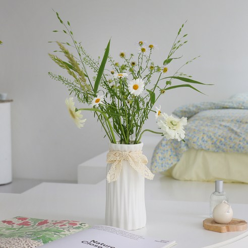 세심한 장인 정신으로 제작된 우유 같은 우아함의 하루의 공간 우유 원형 도자기