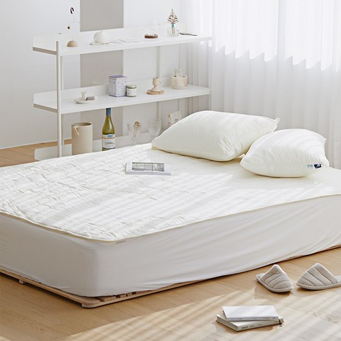 미끄럼 방지와 편안함을 제공하는 루아베 워싱 침대패드 고정밴드형으로 평온한 수면을 경험하세요.
