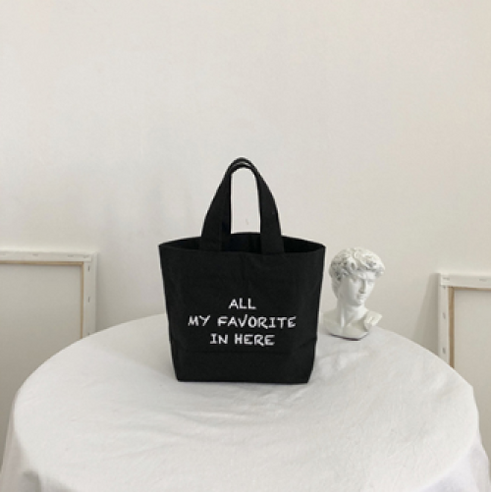 밝은 미소와 스타일을 한 번에 선사하는 스타일라이즈 스마일 캔버스 에코백