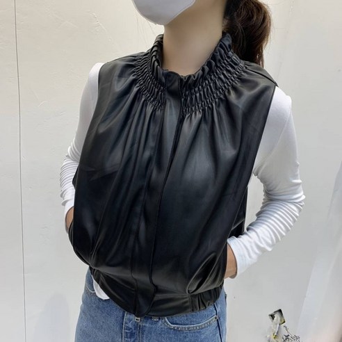 유니크한 디자인의 블랙 조끼 베스트