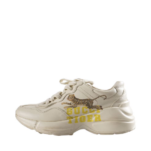 These Rhyton sneakers feature the iconic 'Gucci Tiger' print.