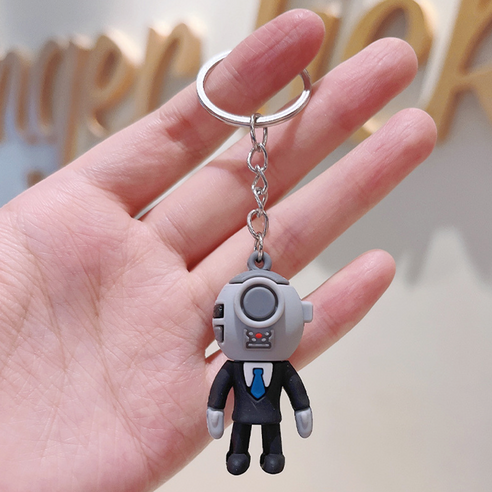 귀엽고 생생한 디자인의 스키비디 토일렛 키링으로 열쇠를 쉽게 관리하고 개성을 더하세요.