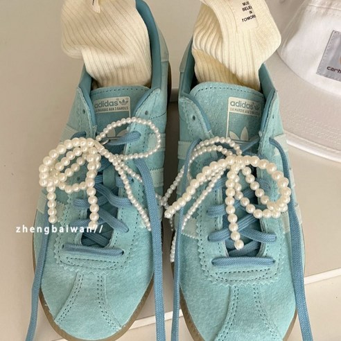 SW 진주 리본 키링: 당신의 신발에 우아함을 더하다