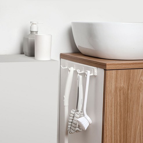 주방 공간 확보를 위한 슬라이드 틈새 수납걸이