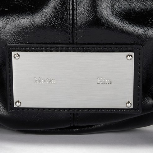 마뗑킴 하프 셔링 리본백: 우아함과 편의의 완벽한 조화